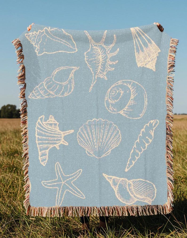 light blue blanket with white seashells, vintage sealife coastal decor nautical theme tapestry