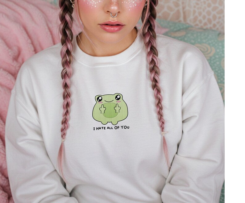 Frog flipping the bird with the text i hate all of you in black below Embroidered Sweatshirt Funny Frog Gift Goblincore Frog Lover Gift Cool Frog Outfit Frog Retro Meme Green Frog Embroidered Crewneck