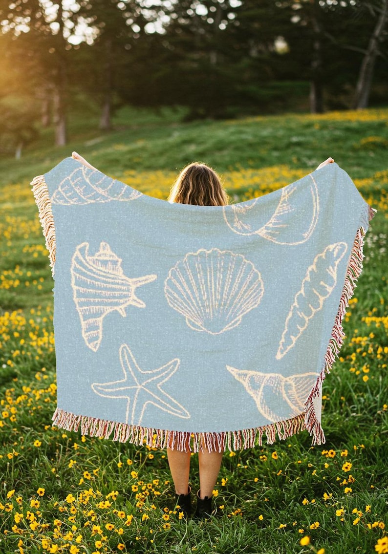 light blue blanket with white seashells, vintage sealife coastal decor nautical theme tapestry