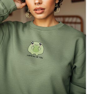 Frog flipping the bird with the text i hate all of you in black below Embroidered Sweatshirt Funny Frog Gift Goblincore Frog Lover Gift Cool Frog Outfit Frog Retro Meme Green Frog Embroidered Crewneck