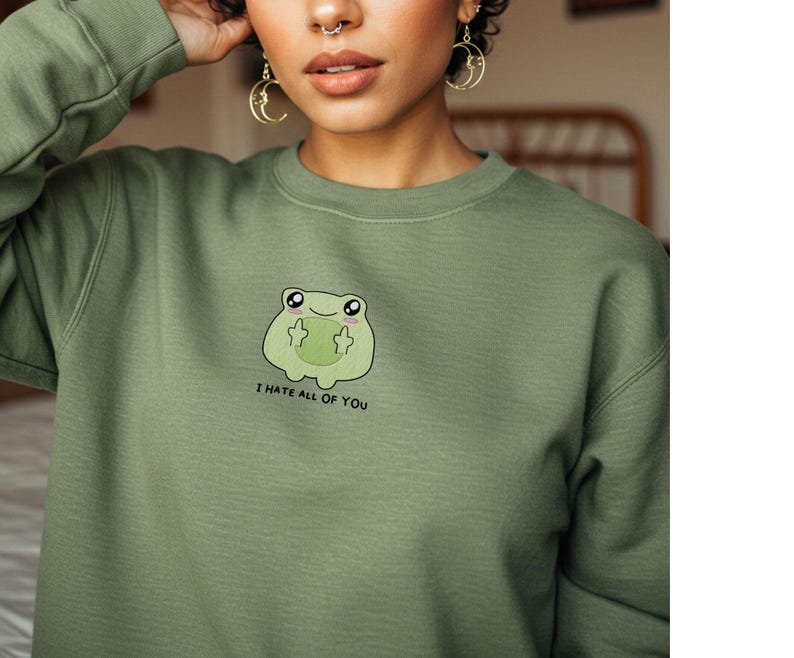 Frog flipping the bird with the text i hate all of you in black below Embroidered Sweatshirt Funny Frog Gift Goblincore Frog Lover Gift Cool Frog Outfit Frog Retro Meme Green Frog Embroidered Crewneck