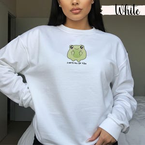 Frog flipping the bird with the text i hate all of you in black below Embroidered Sweatshirt Funny Frog Gift Goblincore Frog Lover Gift Cool Frog Outfit Frog Retro Meme Green Frog Embroidered Crewneck