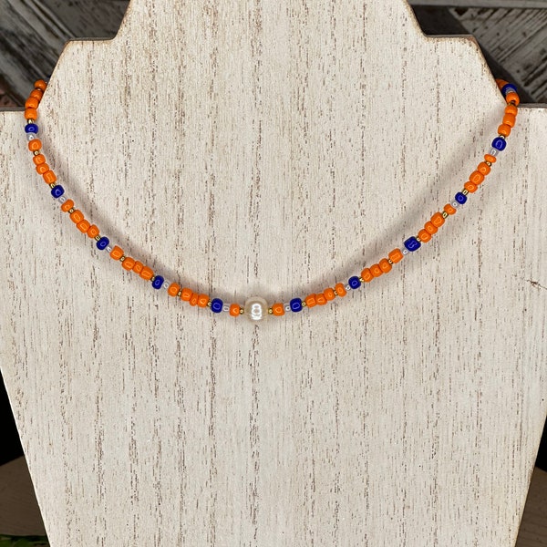 Orange, blue, and white beaded necklace