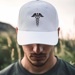 May include: A white baseball cap with a black caduceus emblem. The cap has a curved peak and a structured crown. The design is centrally placed on the front, providing a clean and professional appearance. A versatile accessory.