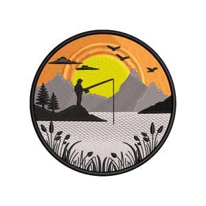 May include: Embroidered patch featuring a fishing scene. A fisherman stands on a rock, casting a line into the water, with mountains, a sunset, and birds in the background. The patch is round with a black border.