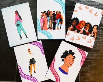 May include: Five greeting cards with illustrations of women in various styles. The cards feature drawings of women in different outfits, with decorative borders and butterfly or wave patterns. The color palette includes pink, blue, and black.