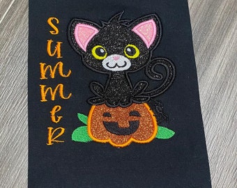 Kitten Sitting on Pumpkin