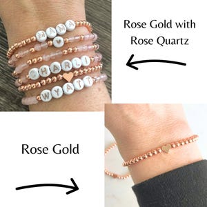 Stacked stretch beaded bracelets with gold-tone and pale-blue beads; white alphabet beads spell names for a personalized kids name bracelet set.