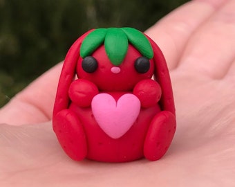 Cute (mini size) strawberry bunny holding a heart polymer clay figurine, desk buddy