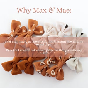 May include: A set of 10 brown and cream cotton hair bows with metal clips. The bows have different patterns, including polka dots and floral designs. The text "Why Max & Mae: 5 set multipack. 10 bows total. 100% cotton bow sets on metal clips. Beautiful neutral colors and patterns that go with any outfit." is displayed on a pink background.