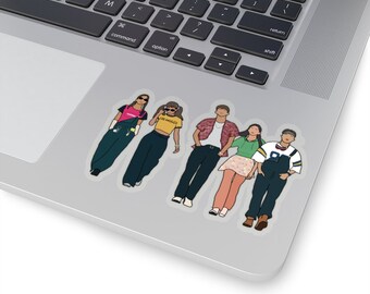 May include: A sticker featuring a group of five cartoon figures. The figures are all wearing different outfits, including a pink shirt with a white collar, a yellow shirt with the words "Los Angeles" on it, a red and white patterned shirt, a green shirt with a white collar, and a blue shirt with a white collar. The figures are all standing in a line, with the figure in the pink shirt at the front and the figure in the blue shirt at the back.