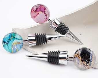 Marble Elegance Meets Modern Art: Epoxy Bottle Stopper. Stand out from the crowd add a touch of creativity to every bottle that you pop!