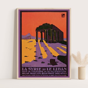 May include: A vintage travel poster advertising travel to Syria and Lebanon. The poster features a colourful illustration of an ancient temple with a purple, orange and yellow colour scheme. The text on the poster reads "La Syrie et le Liban Pays de Tourisme et de Villegiature Bon Air. Beaux Sites. Belles Routes. Bons Hotels" and includes contact information for travel agencies in Paris and Cairo.