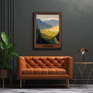 May include: Vintage travel poster depicting a scenic mountain landscape with a winding road leading to the town of Grenoble, France. The poster is in shades of green, brown, and blue, with the text "Chemins de Fer Paris, Lyon, Mediterranee" and "Services Automobiles de la Route des Alpes" at the top and bottom, respectively.