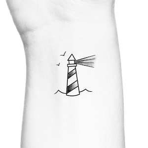May include: A black and white line drawing of a lighthouse with a beam of light shining out from the top. There are three birds flying in the sky above the lighthouse.