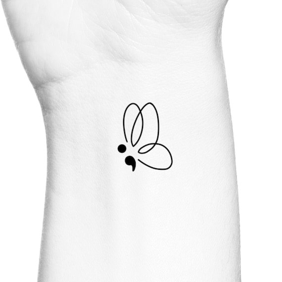 Butterfly semicolon tattoo | Tattoos, Semicolon tattoo, Paw print tattoo