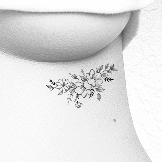 18+ Minimalist Flower Rib Tattoo