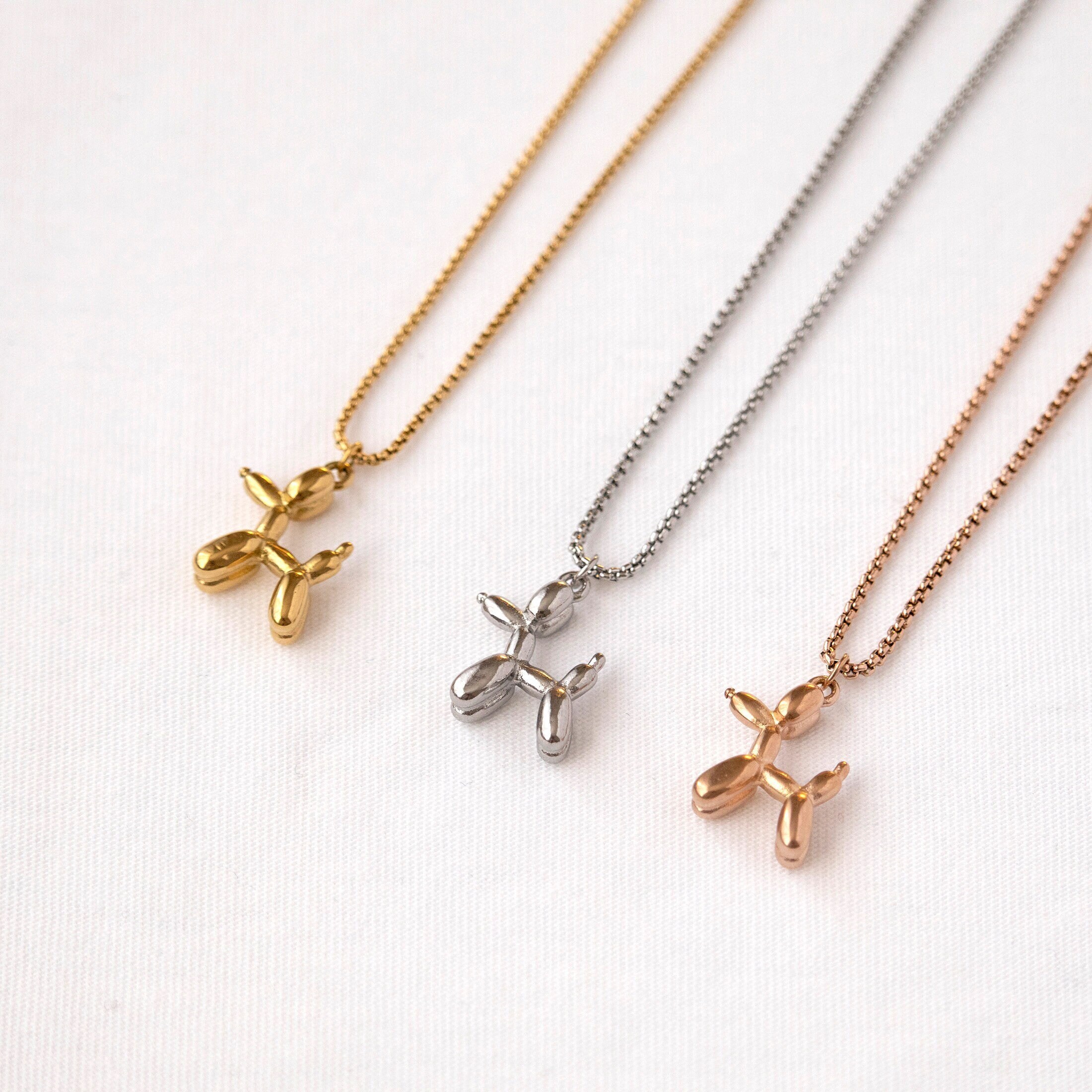 Gold store animal pendants