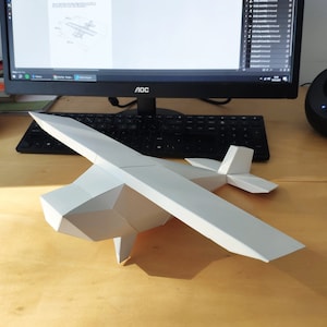 Paper Airplane. Make a paper airplane with this papercraft cut out template download in PDF and SVG for Cricut.