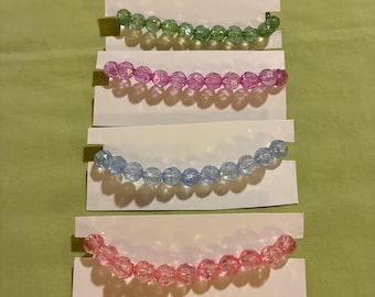 Set of 4 handmade beaded bracelets, green, purple, blue & pink
