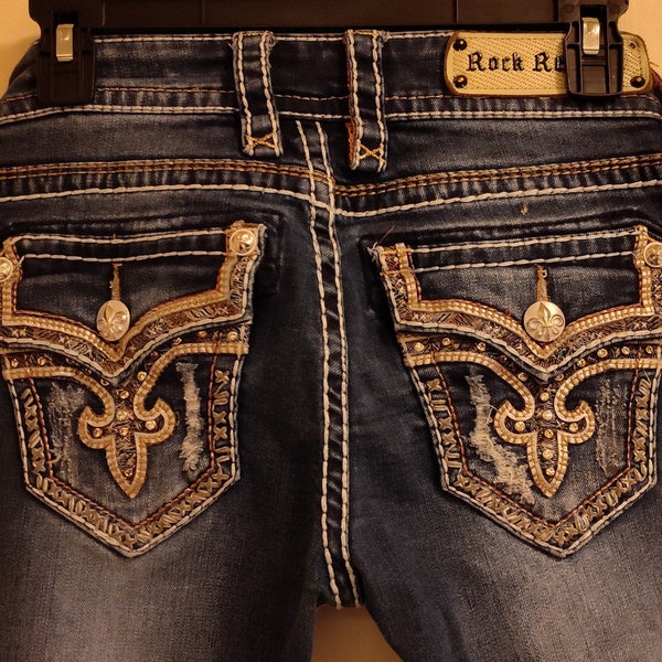 Rock Revival Boot Cut Low Rise Thick Stitched Fleur De Lis Design Style RJ600082 Tibbie Size 26 Jeans