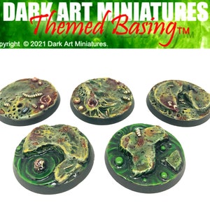 May include: Five round, green, brown, and white painted miniature bases with a swamp or bog theme.  The bases are designed for use with miniature figures.