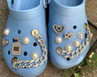 blue crocs with charms