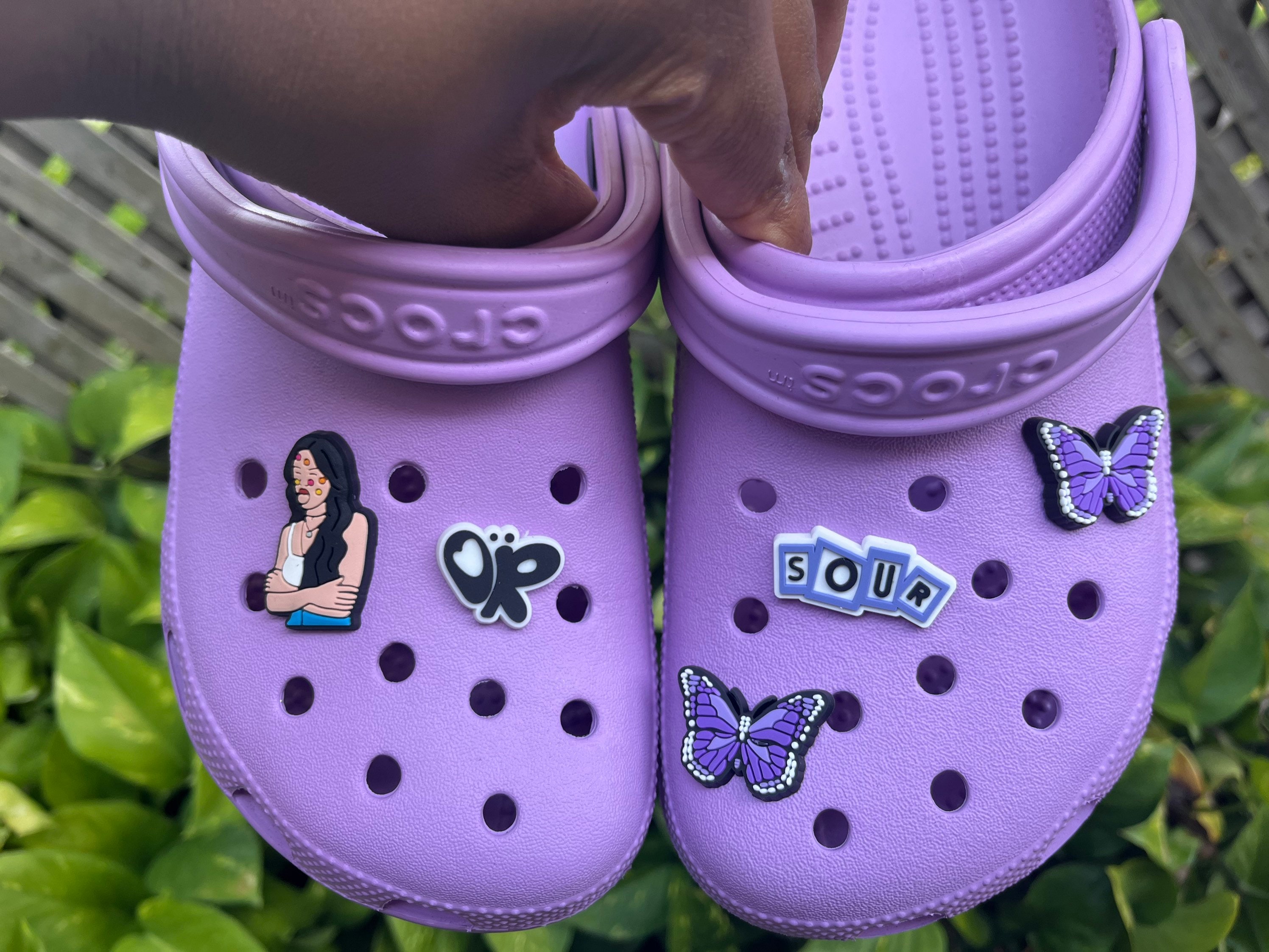 Famous Footwear - Load up your lilac Crocs 💜 Jibbitz™ charms sold  separately. Available in stores and for in-store pickup. Monochrome magic