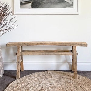 Storage bench with side table clearance