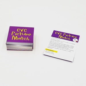 May include: A stack of purple cards with the text "CVC Picture Match" in yellow letters. The cards are part of a game for learning CVC words.