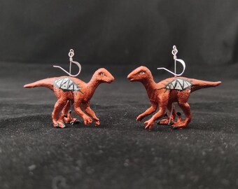 Velociraptor Dinosaur Earrings - copper bronze with black and white symbols
