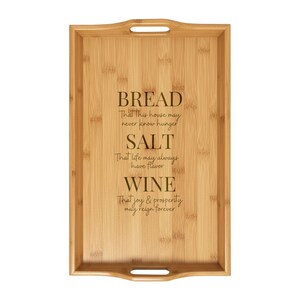 May include: A rectangular bamboo serving tray with handles. The tray features engraved text: "BREAD That this house may never know hunger, SALT That life may always have flavor, WINE That joy & prosperity may reign forever."