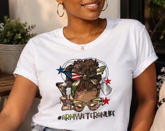 May include: A white short-sleeve t-shirt featuring a graphic of a person with a camouflage headwrap, American flag pattern, and glasses. Below the graphic, the text reads #ARMYVETERANLIFE. The design includes small red and blue stars.