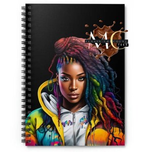 May include: A black and white spiral notebook with a colorful illustration of a woman with rainbow braids and a yellow jacket. The text "MELANIN CHOCOLATE TEES" is on the cover.