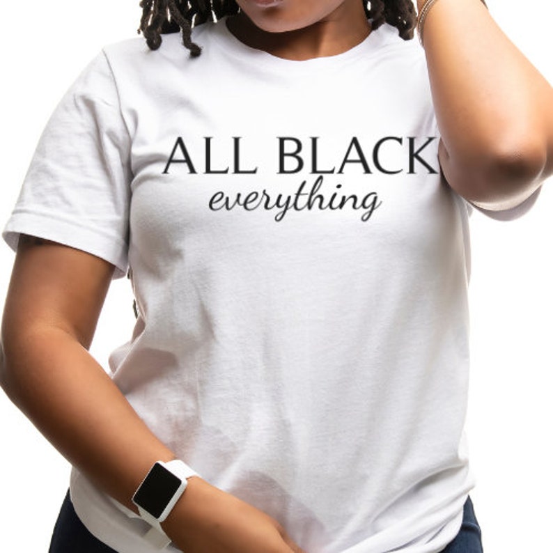 May include: White t-shirt with black text that reads "ALL BLACK everything".