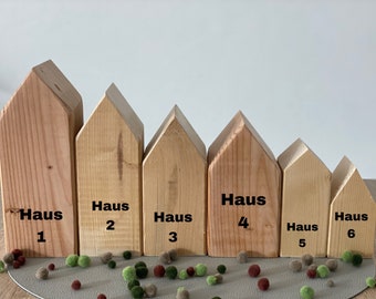 cheaper on www.tommywood.de Decorative houses made of wood