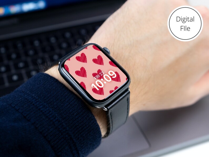 May include: A black smartwatch with a pink watch face featuring a pattern of red hearts and the time 10:09. The watch face also displays the date, FRI 23.