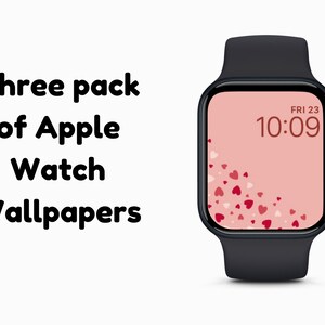 May include: Three pack of Apple Watch wallpapers with a pink background and a pattern of red and white hearts. The watch face displays the time as 10:09 and the date as FRI 23.
