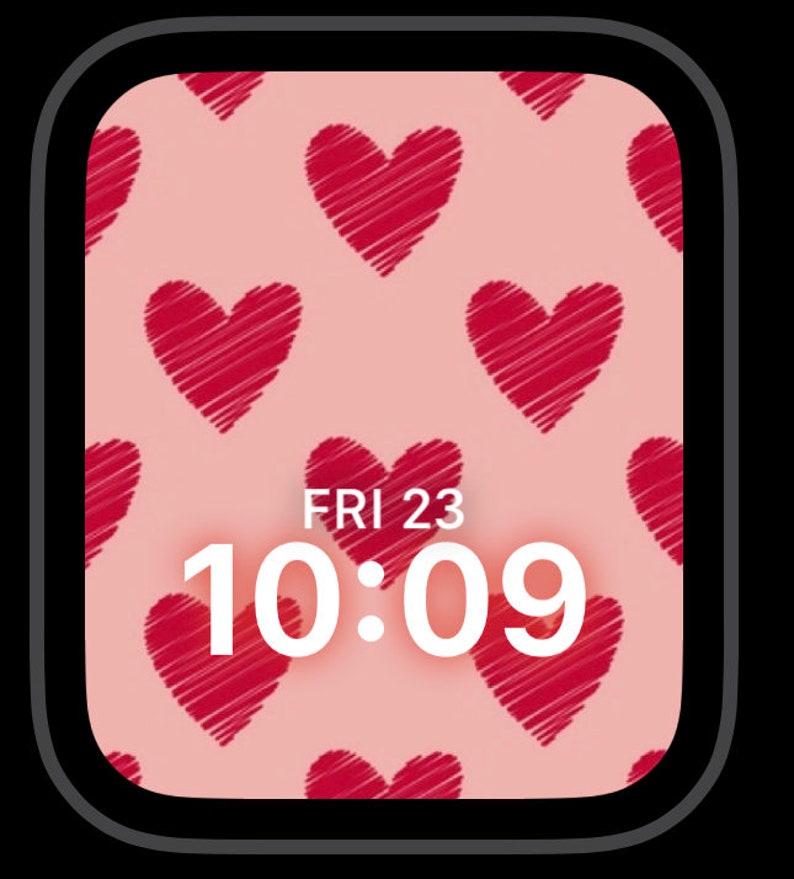 May include: A pink watch face with a pattern of red hearts. The time is 10:09 and the date is FRI 23.
