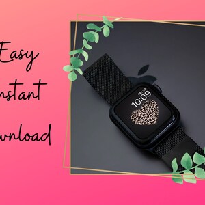 K&ouml;nnte beinhalten: Eine schwarze Apple Watch mit einem schwarzen Metallband und einem Leopardenherz auf dem Bildschirm. Das Zifferblatt der Uhr zeigt die Zeit 10:09 und das Datum Freitag, den 23.