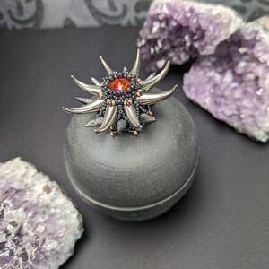 Small ceramic jewelry box with glass beads. A symbiosis of pottery and bead embroidery as a unique piece.
