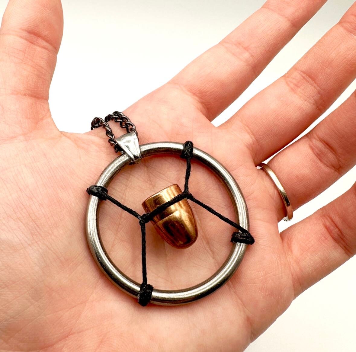 thumbnail image 2 of Cyberpunk 2077 V’s Bullet Necklace – Official No Future Pendant Charm With Chain, Brushed Nickel Replica #/2077 2 of 4