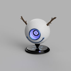 May include: A spherical, white robot with a textured surface, featuring a blue glowing eye and a smiling blue line. Two small brown branches protrude from the top. It sits on a black base with a decorative pattern.