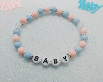 Armband Babyparty / Gender Reveal Party - Armband in Rosa/Blau
