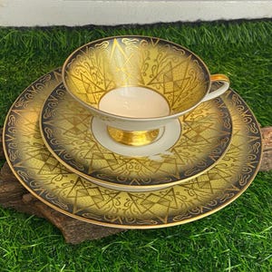 Set vintage di 3 pezzi composto da tazza e tazzina, in porcellana di Marktredwitz Jäger & Co., con decorazioni dorate su sfondo nero/giallo, stile vintage shabby chic.