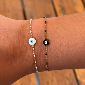 Bracelet or necklace with pearls and Greek eye of protection