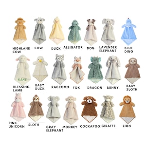 May include: A collection of twenty plush animal security blankets, each featuring a soft stuffed animal head attached to a square fabric body. The animals include a cow, duck, alligator, dog, elephant, dinosaur, lamb, raccoon, fox, dragon, bunny, sloth, unicorn, monkey, cockapoo, giraffe, and lion.