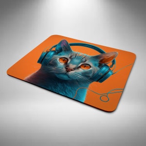 May include: A blue cat with orange eyes wearing blue headphones against an orange background.