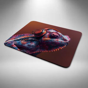 May include: A colourful chameleon with red headphones on its head. The chameleon is on a brown background.