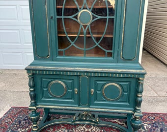An Antique Jacobean Teal w/ Gold Edging China Hutch/Cabinet